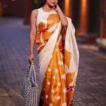 Art Silk Printed and Polka Dot Saree With Blouse Piece